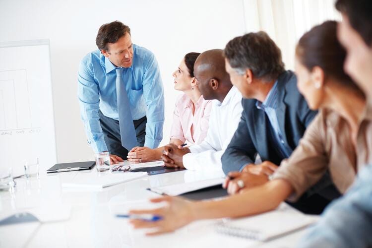 a group of people discussing something