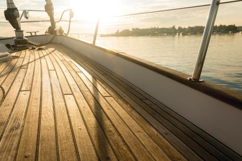 a wooden dock on a body of water