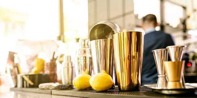 a counter with a few lemons on it