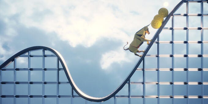 a yellow crane on a metal frame