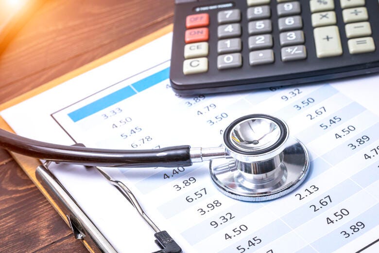 a pair of glasses on a notebook